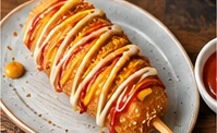 Representative photograph of Egg\ Sausage\ \(Corn\ Dog\)